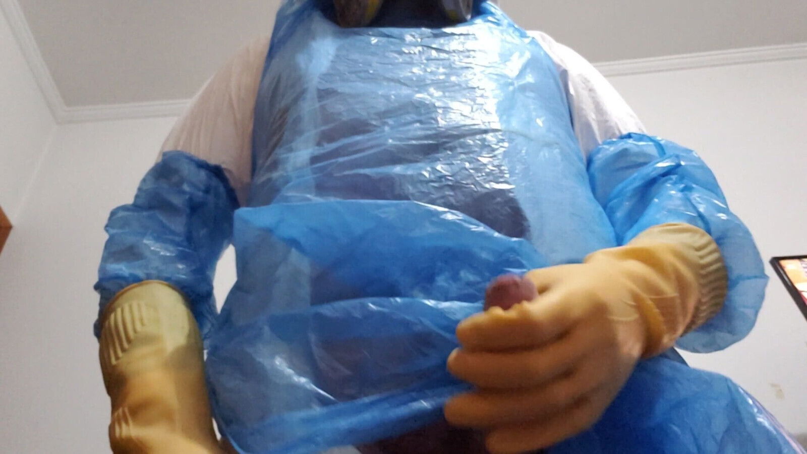 Handjob from gloves, mask and rubber boots