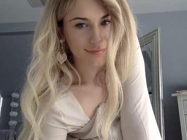 TS angel plays with herself on webcam.