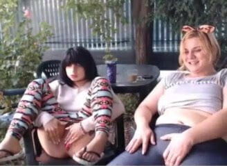 Two girls playing in public