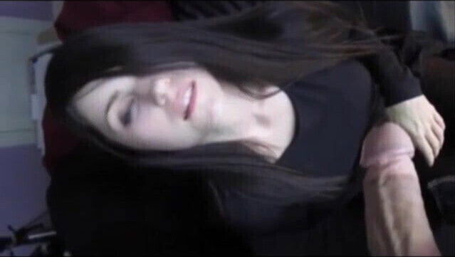 Hot brunette sucks a big white cock and gets a facial