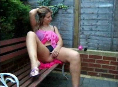 busty wife stripping in the garden