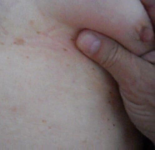 squeezing rubbing clit