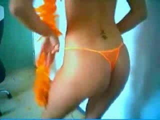 Athletic girl shows her naked body in strip dancing on the camera