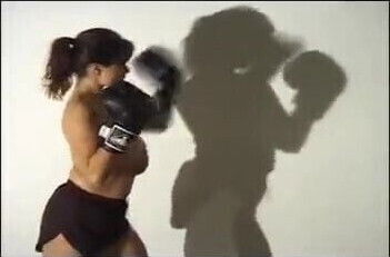 Beautiful lady shadowboxing so cute and playful ! 