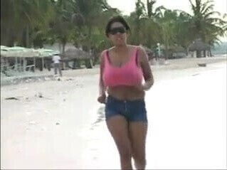 Big boob latina jogging at the beach 