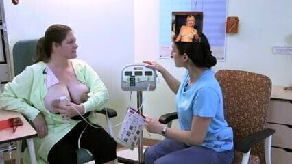 Pretty nurse shows chubby squeeze milk from