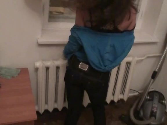 Angel gives head in front of open window