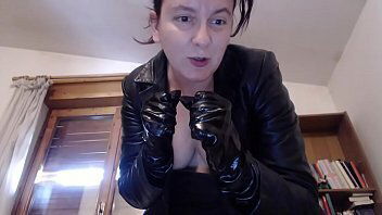 Your Italian dominatrix dressed leather strangles verbally physically abuses
