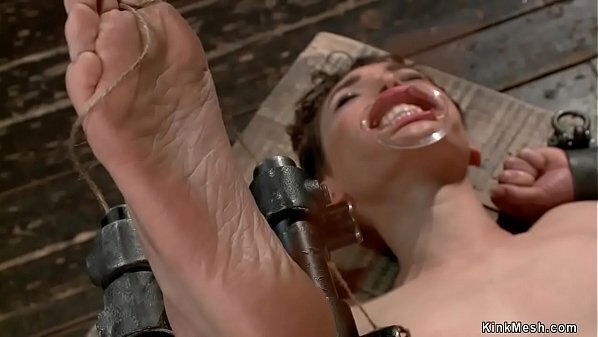 Gagged brunette strapped Sybian