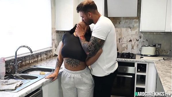 Busty brunette gets kitchen