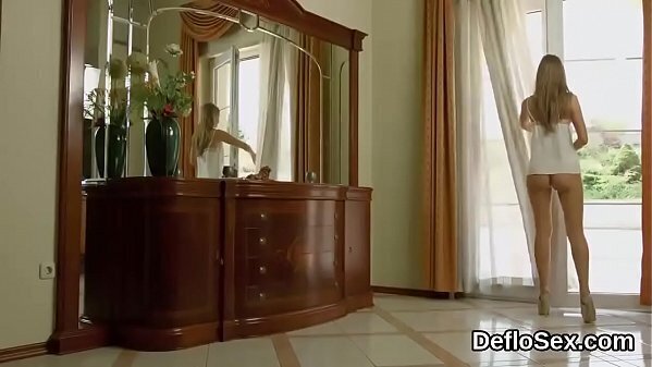 Seductive teenie finger fucks cunt until climaxing