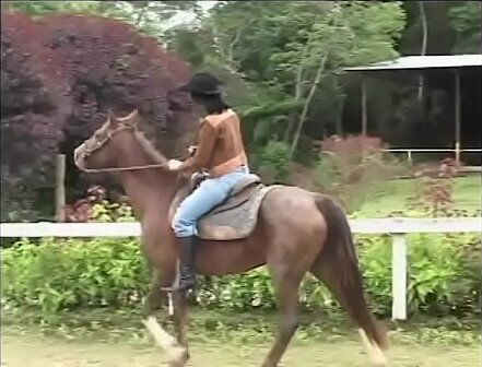Darkskinned groom helps white chick with raven hair Cristal Luna recover from surprise caused with running horse