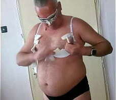 torn , destroyed , ripped satin bra