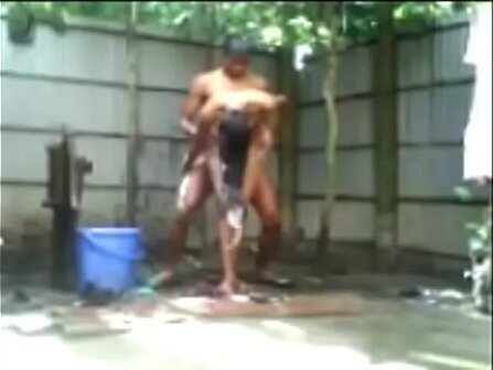 Indian Girl Bathing outside nude faking street