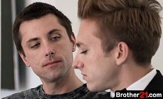 older stepbrother gives passionate kiss, slipping tongue between lips