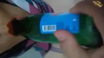 Hot Hjabi Malay Teen Showing Tits And Giving A Blowjob To Bottle