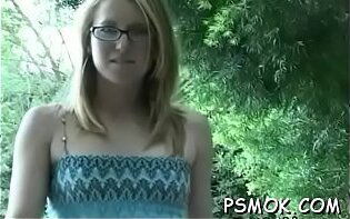 Girl enjoys cigarette while putting weenie mouth