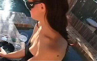 Girl talking phone playing with bald bawdy cleft