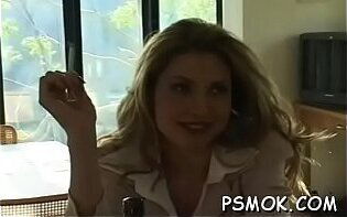 Horny doxy smokin'_ a cigarette and touching herself