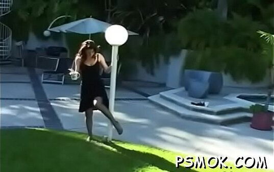 Ebony sucks small pecker while holding cigarette