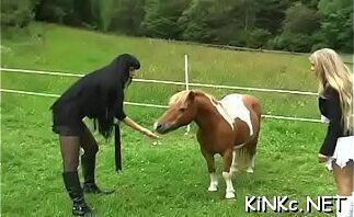 Nasty domina ties up her serf and gives him a handjob