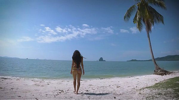 Micro bikini tease sexy teen walks beach