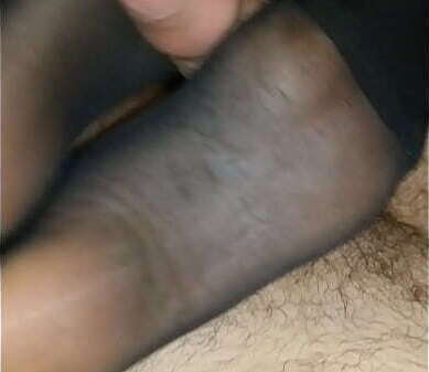 homemade footjob with black pantyhose cumshot