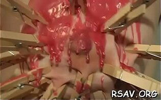 Busty hottie in brutal bdsm act