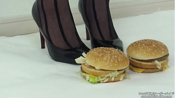 Foodcrush woman steps hamburger with stockings