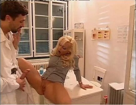 Doctor abusing sexy patient medical office