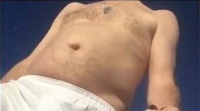 white boxers with stiffie beach