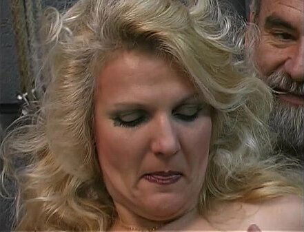 mature woman from TheMilfaholic(dot)com spanked