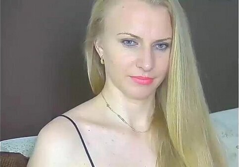 Blonde Prostitute Stares Into Waits Over Face