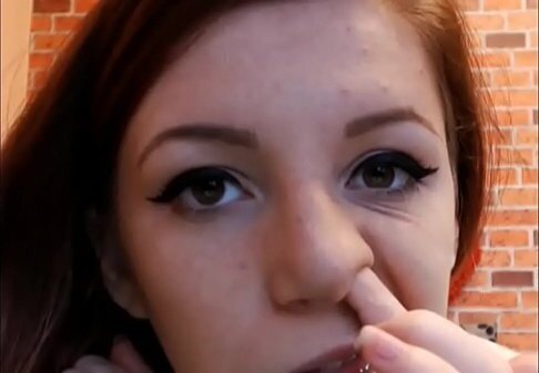 beautiful girl picking nose
