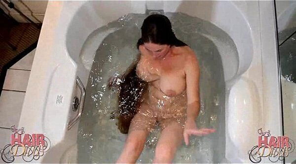 longhaired blonde milf dunking head water