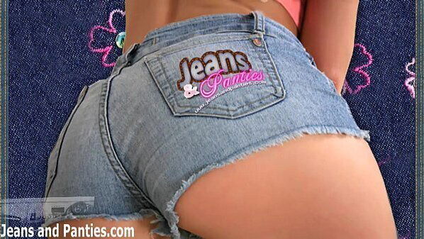 Pigtailed teen Tatiana taking jeans