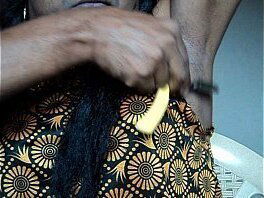 Indian girl shaving armpits hair by straight razor..AVI