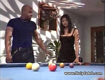 Huge titted Asian whore nailed black hard