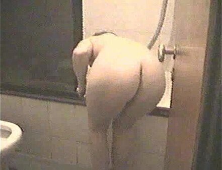 mature wife preparing bath