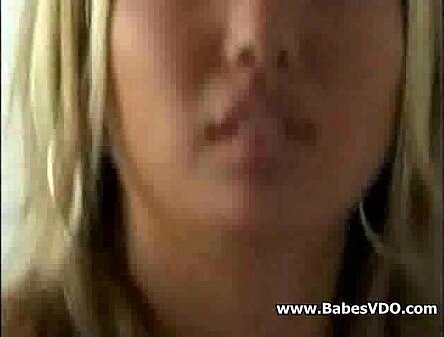 Busty blond Asian very closeup