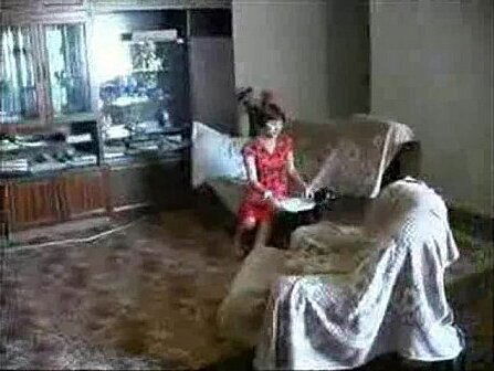 Mother undresses infront