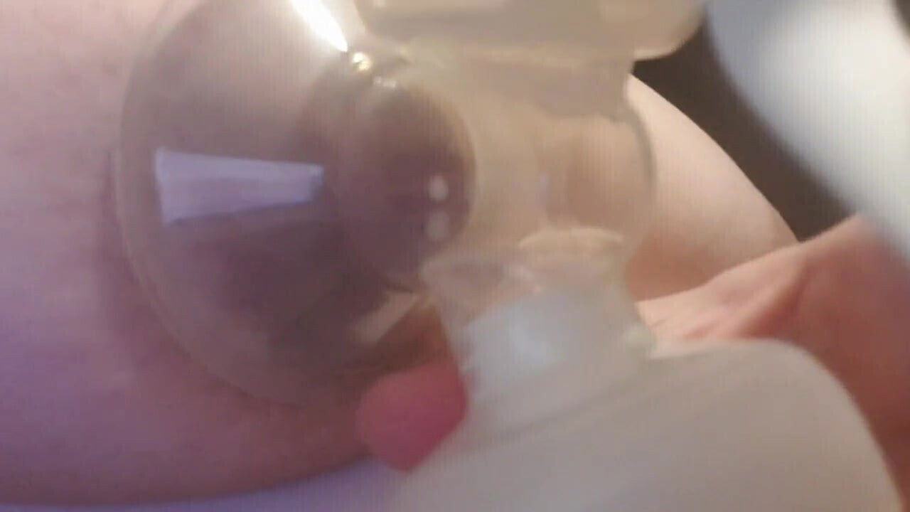 Pumping milk from lactating german woman