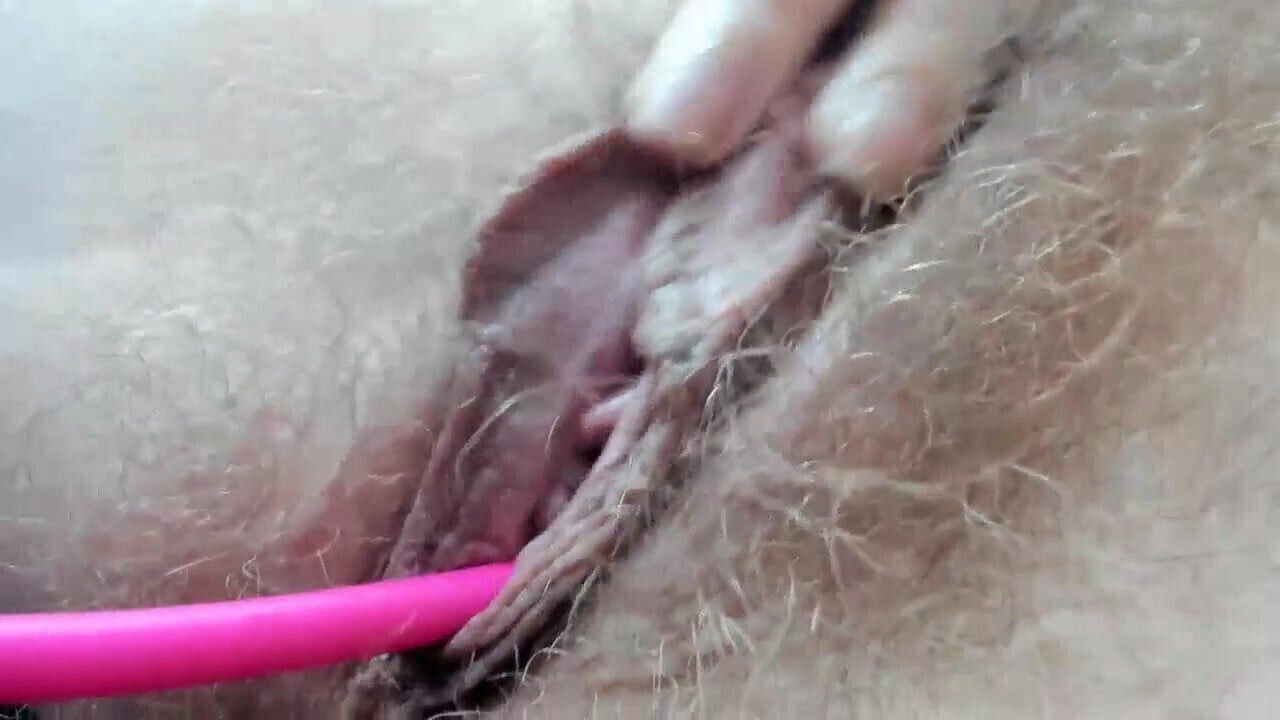 Sweethottea April spreads pussy lips, close