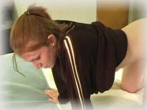 Taking temperature rectally.