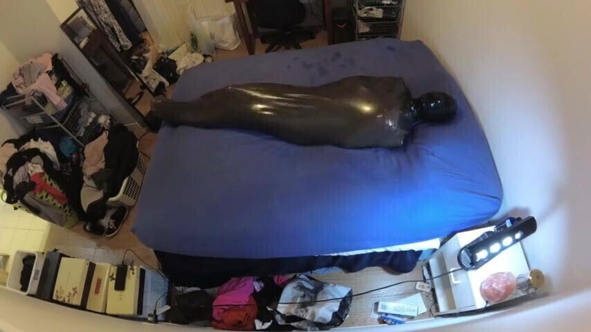 SMOKY LATEX RUBBER ENCASED BREATHPLAY