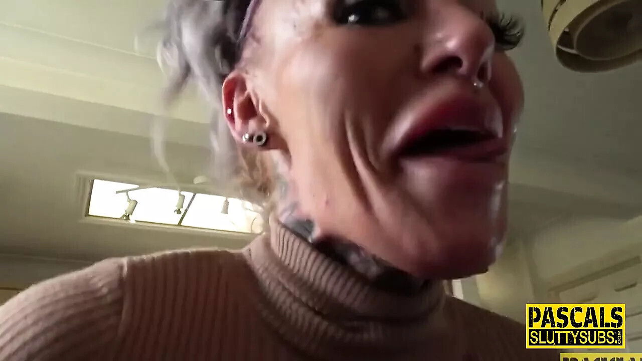 Tattooed submissive MILF with boobs