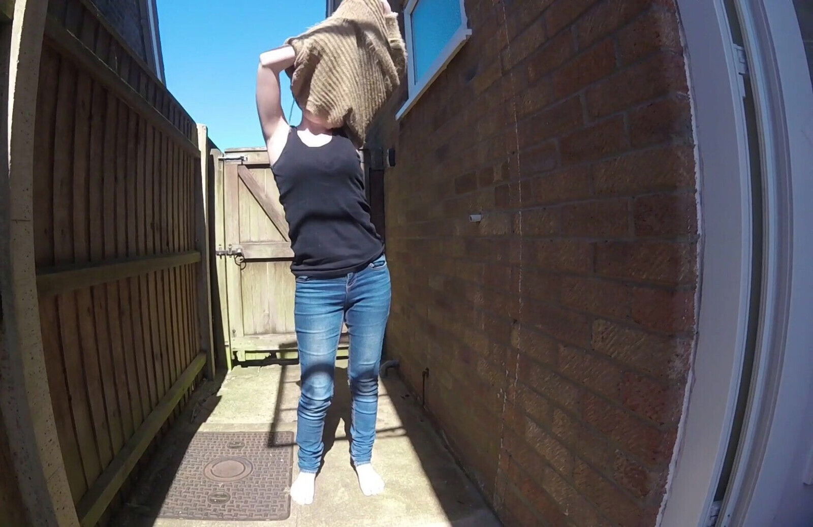 Skinny undressing outdoors