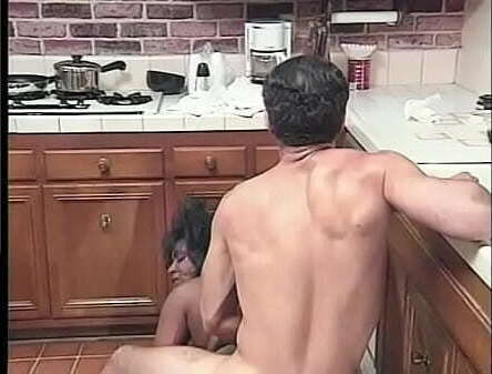 with afro hair lady antoinette bends over kitchen take from back