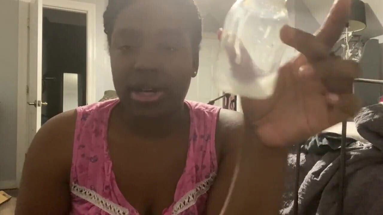 Busty black woman shows squeezes milk from
