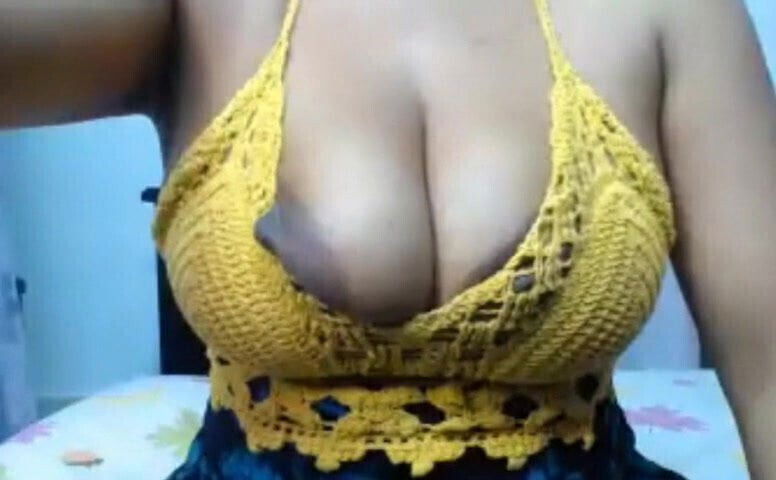 Mature huge with brown nipples areolas, close-up